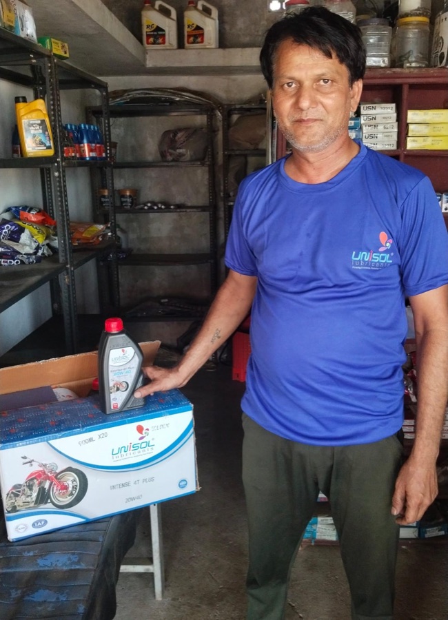 Unisol Lubricants distributor at his shop